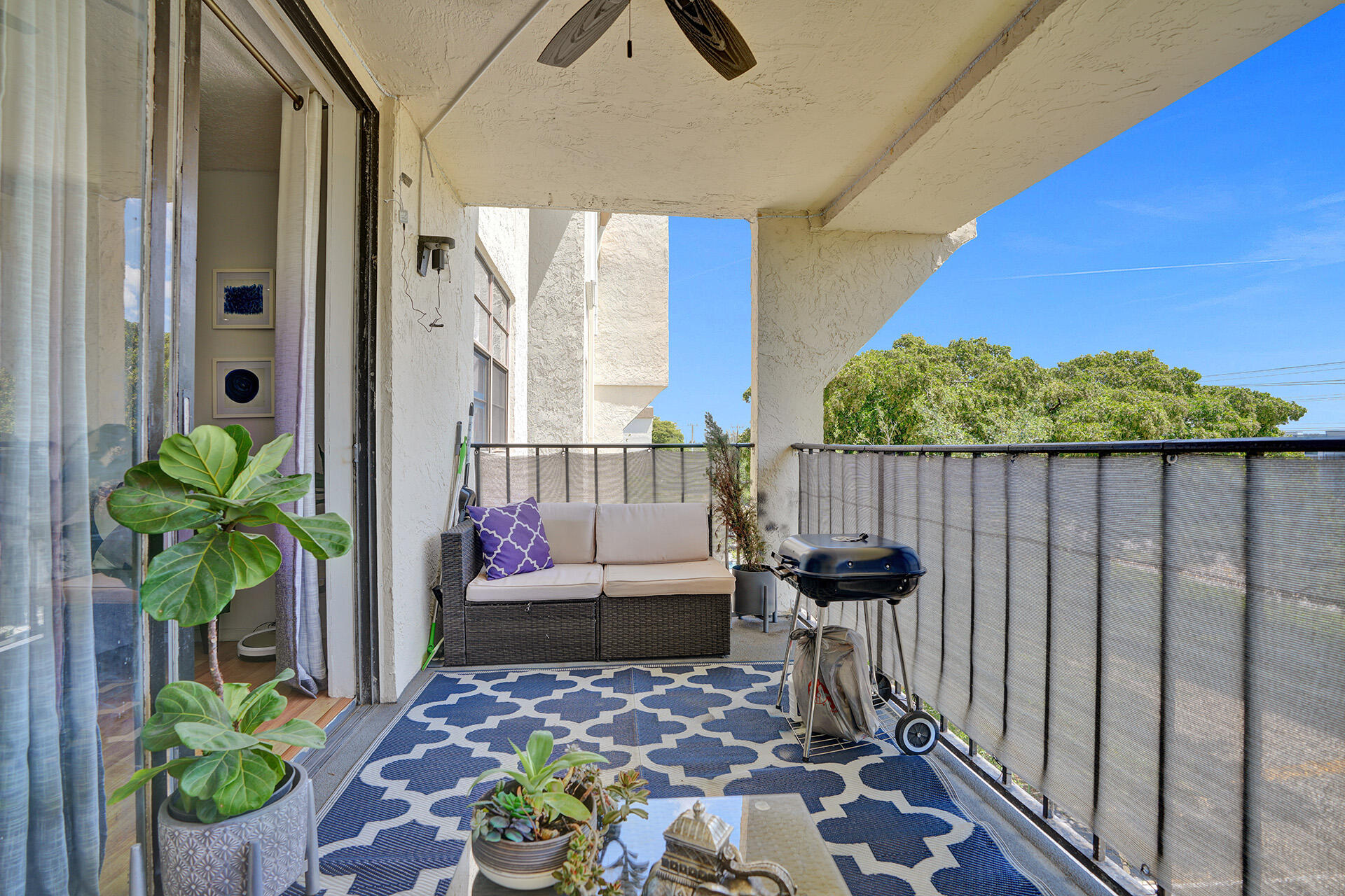 6193 Rock Island Road, Unit 405 Tamarac, FL 33319 - Photo 2 of 42 a view of balcony with furniture