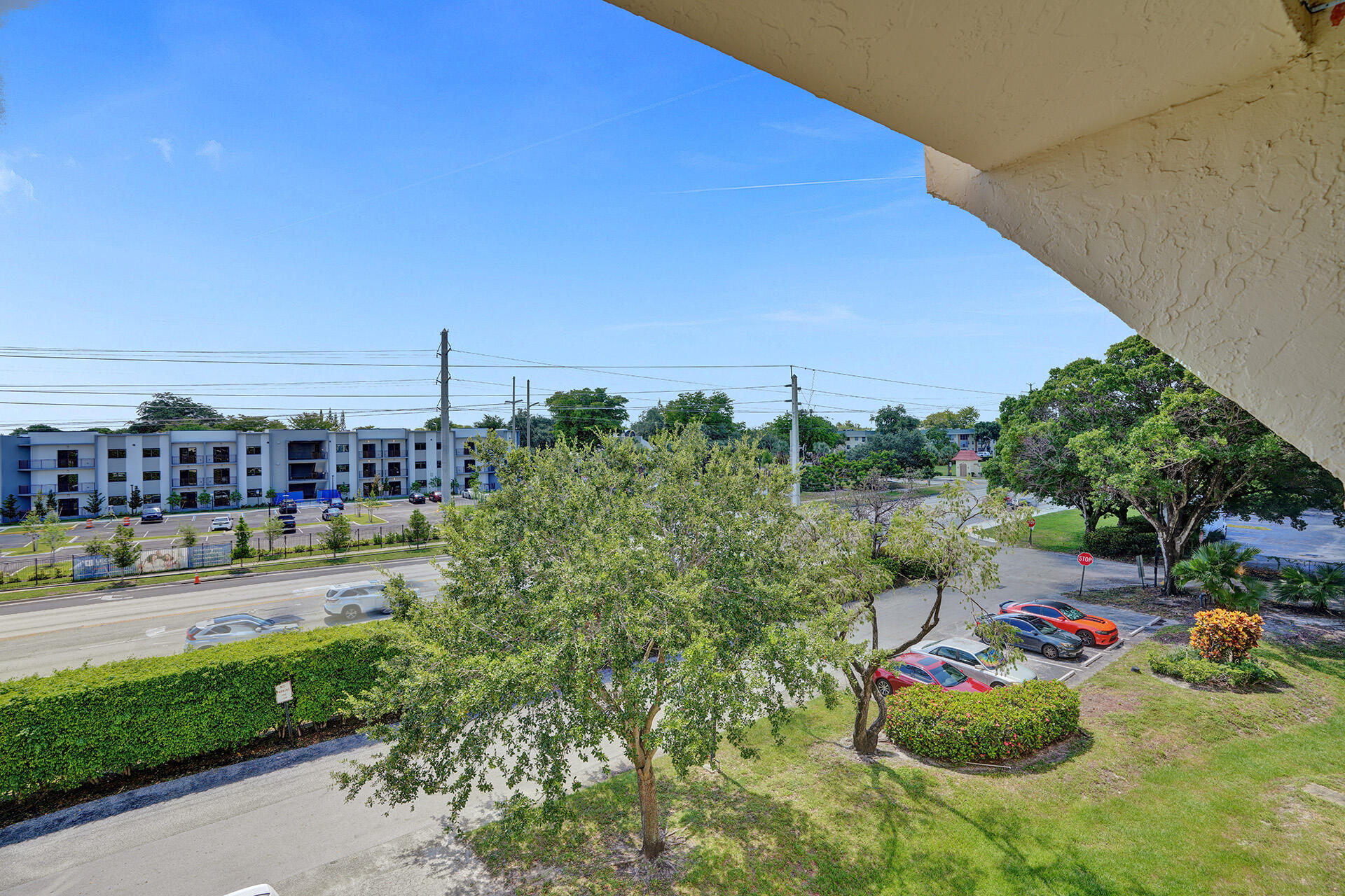6193 Rock Island Road, Unit 405 Tamarac, FL 33319 - Photo 24 of 42 a view of outdoor space yard and swimming pool