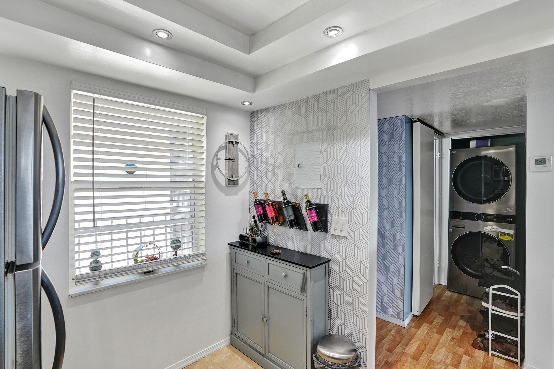 6193 Rock Island Road, Unit 405 Tamarac, FL 33319 - Photo 31 of 42 a kitchen with a refrigerator and a stove top oven