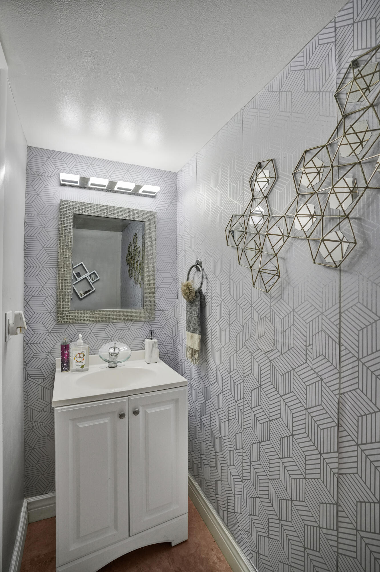 6193 Rock Island Road, Unit 405 Tamarac, FL 33319 - Photo 5 of 42 a bathroom with a sink vanity and mirror