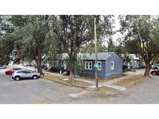 a black and white photo of a house