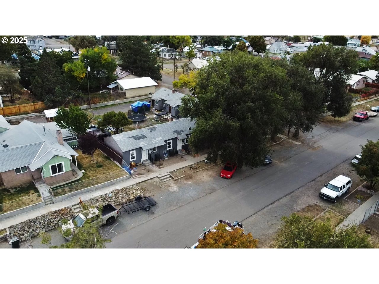210 Jefferson Street West Huntington, OR 97907 - Photo 2 of 14 a picture of a city street with lots of trees