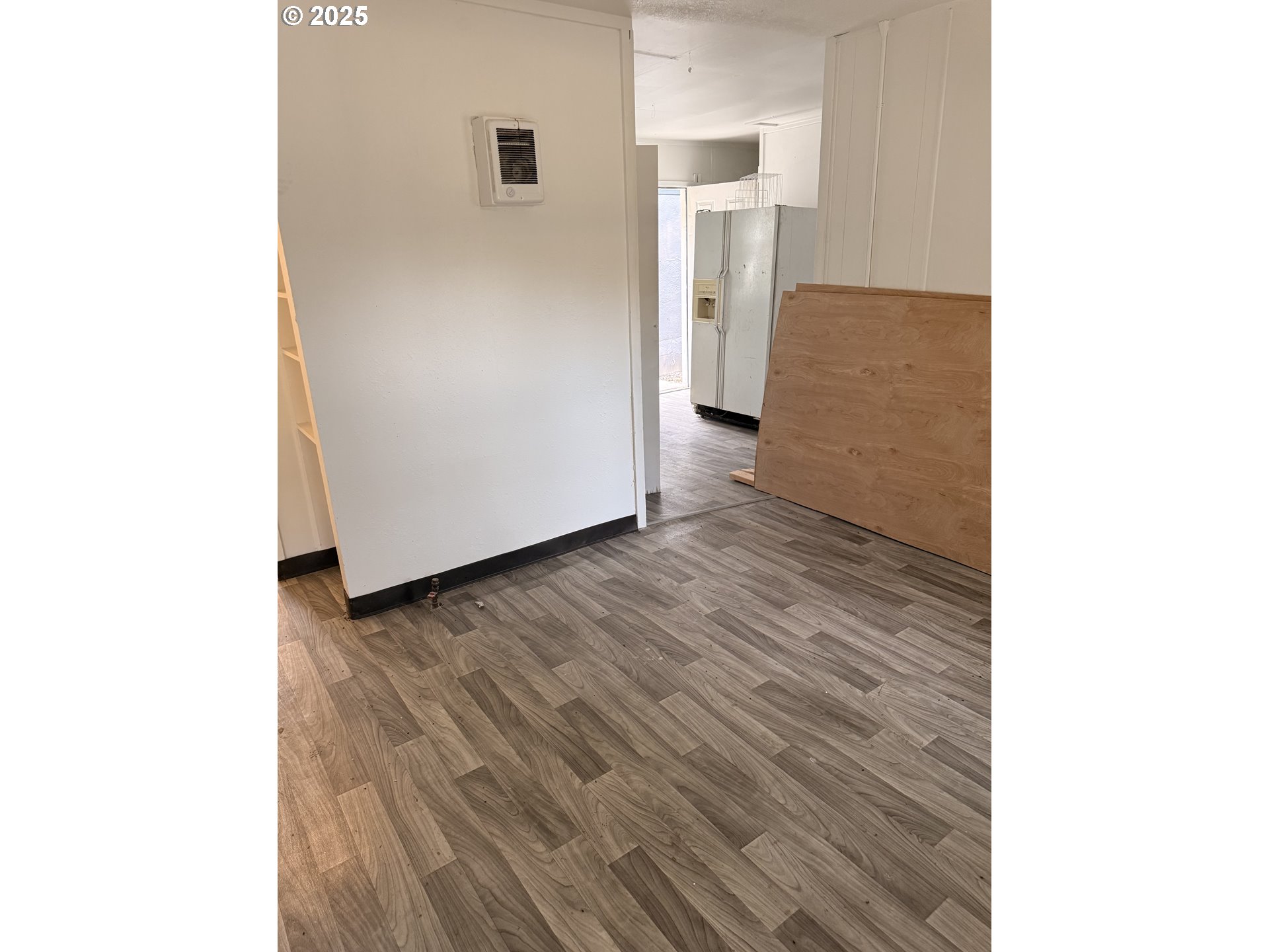 210 Jefferson Street West Huntington, OR 97907 - Photo 8 of 14 a view of a room with wooden floor