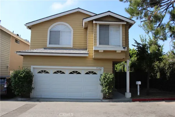 a view of a house with a garage