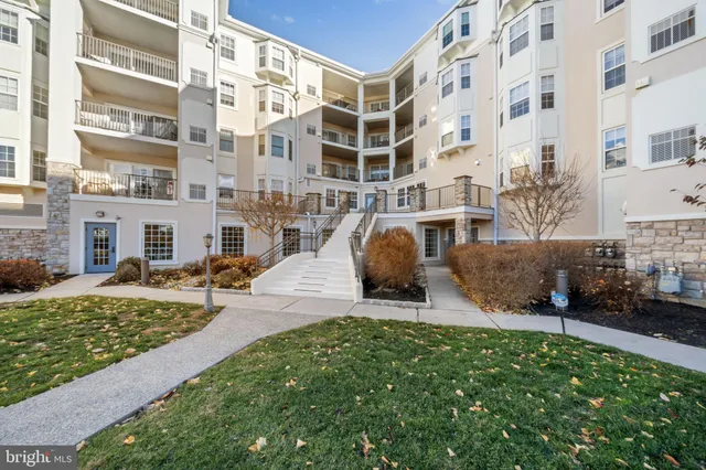a balcony with furniture and city view