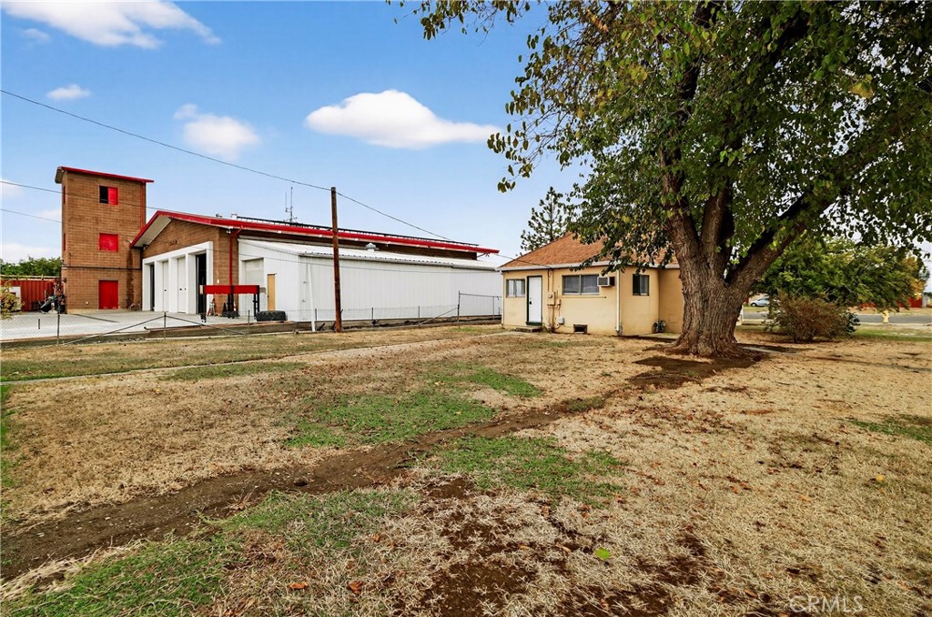 459 South Butte Street Willows, CA 95988 - Photo 30 of 44 a view of a house with a yard