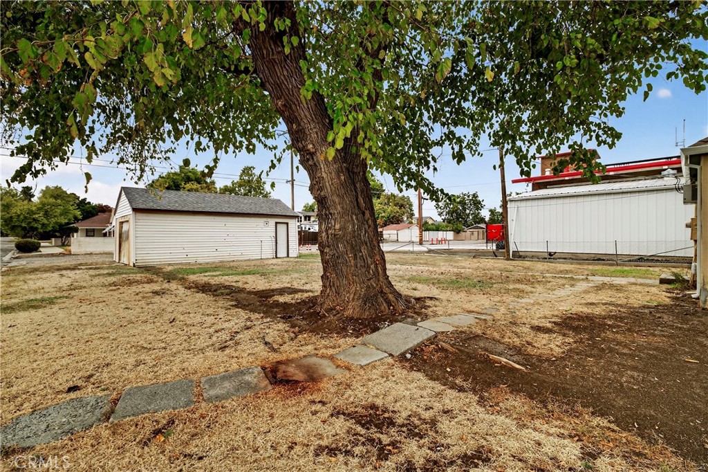 459 South Butte Street Willows, CA 95988 - Photo 31 of 44 a view of a house with a tree