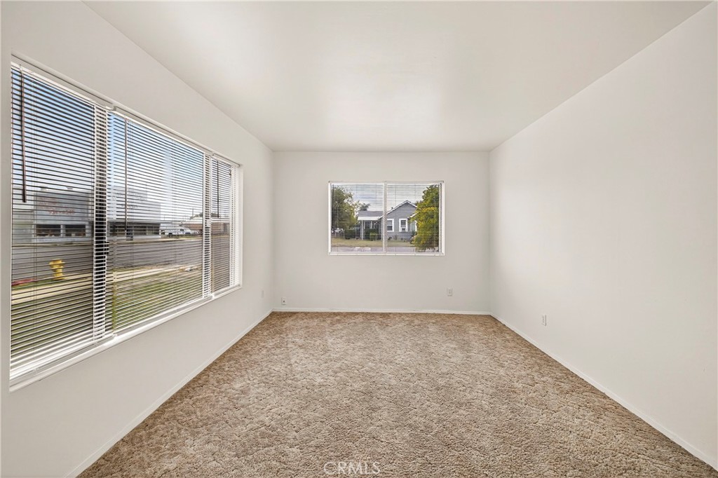 459 South Butte Street Willows, CA 95988 - Photo 7 of 44 an empty room with windows