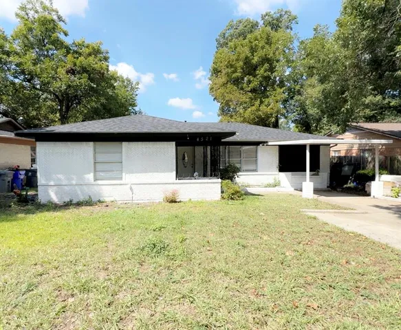 a swimming pool view with a outdoor seating