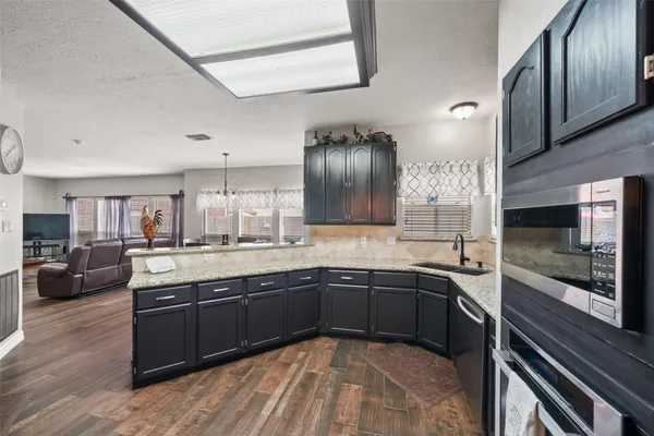 a kitchen with lots of counter space and a sink