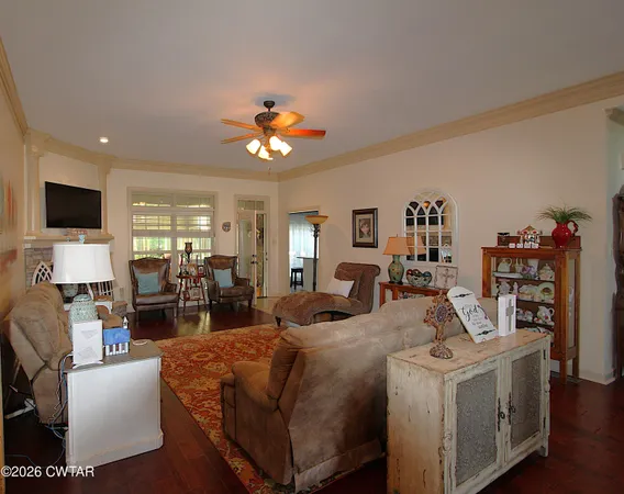 a room with furniture and air hockey table