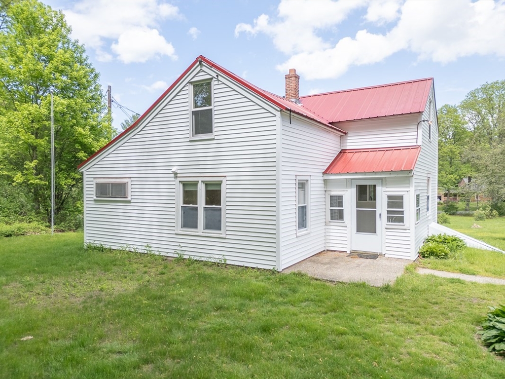 92 Squannacook Road Shirley, MA 01464 - Photo 25 of 38 a front view of a house with a yard