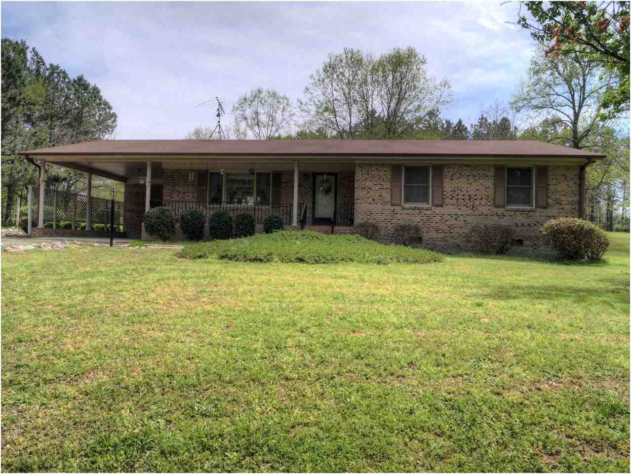 Elegant all brick ranch with front porch and carport. 2+ acres . Huge garage/shop. Private location. Serene setting. Patio in rear. Minutes from either N. Raleigh or N. to town of Creedmoor. Close to all amenities and highway access. Exterior Front