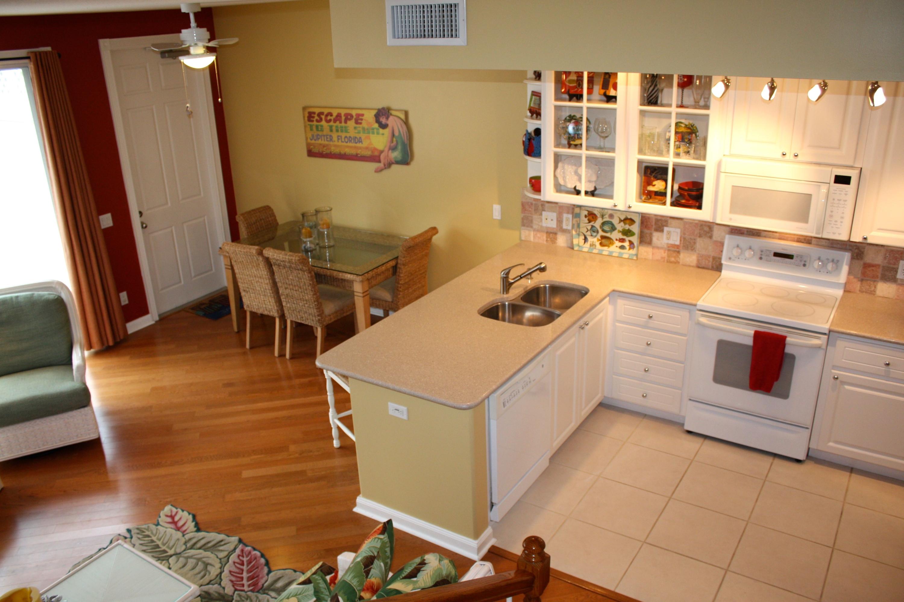 1869 Frederick Small Road Jupiter, FL 33458 - Photo 13 of 24 Kitchen and Dining Area