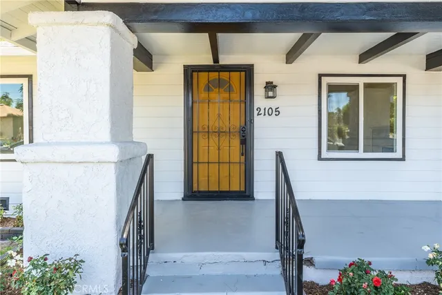 a view of a hallway with windows
