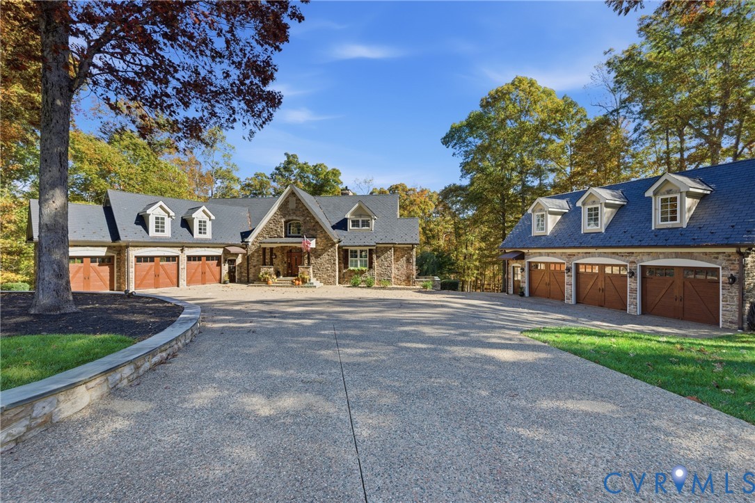 Custom built house featuring driveway, a garage, s