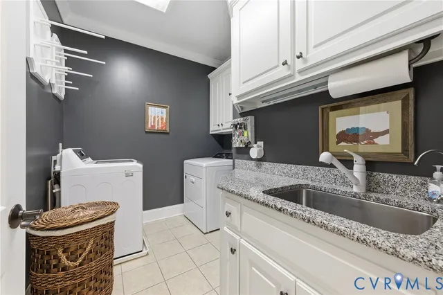 a kitchen with a sink and a stove top oven