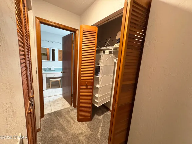 a view of a door and chair in the porch