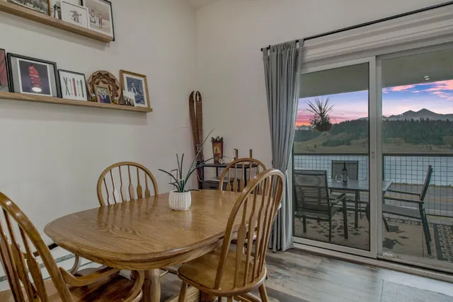 a kitchen with stainless steel appliances granite countertop a refrigerator stove a sink and dishwasher