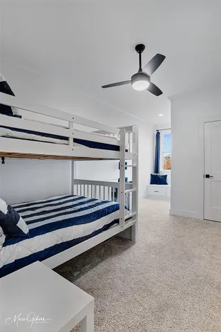 a view of livingroom with hardwood floor and a ceiling fan