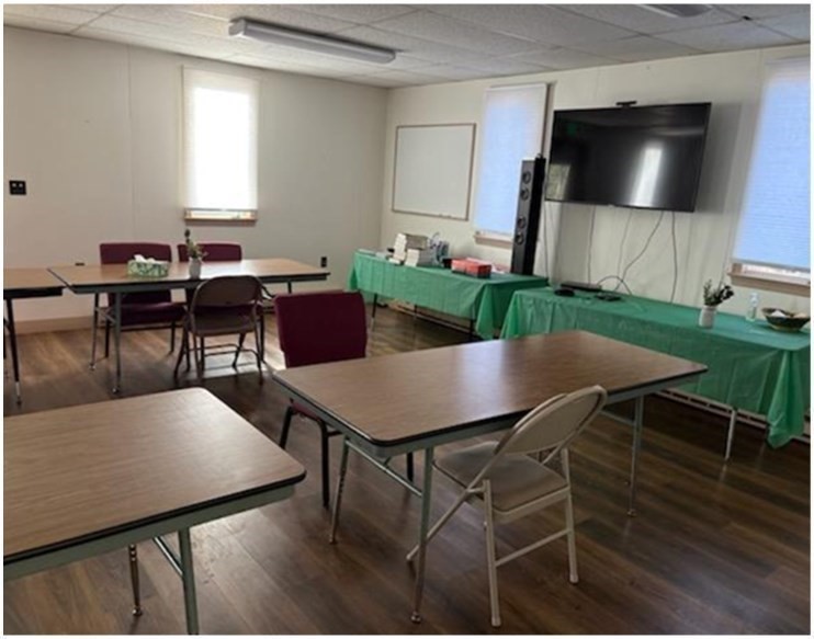 11 Otis Street Mansfield, MA 02048 - Photo 15 of 19 a living room with furniture and a flat screen tv