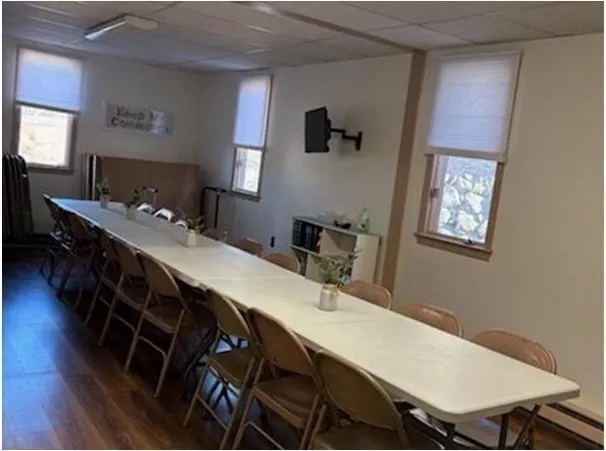 a room with furniture and window