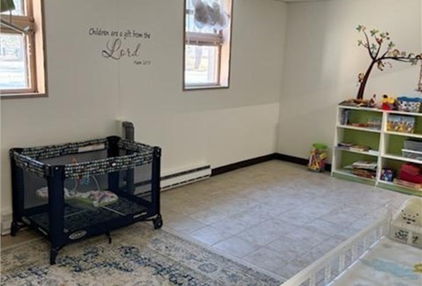 11 Otis Street Mansfield, MA 02048 - Photo 17 of 19 a room with furniture and window