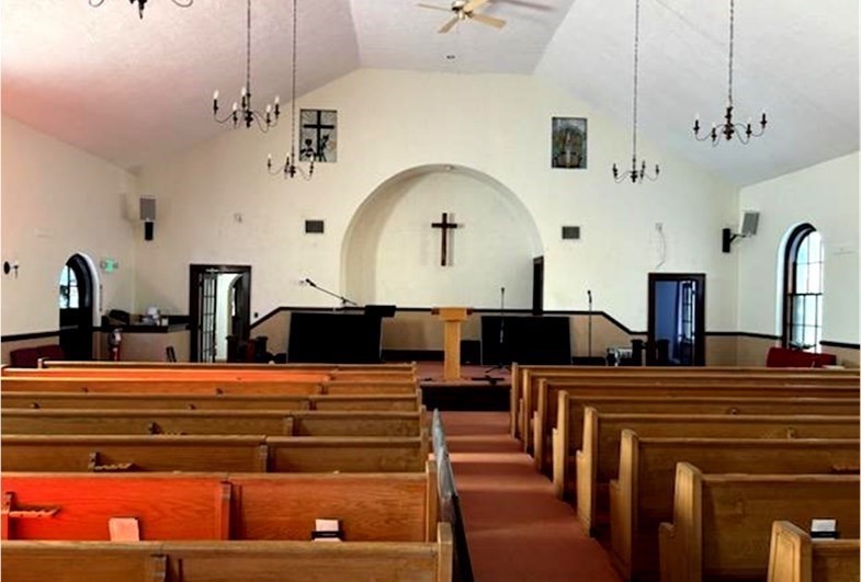 11 Otis Street Mansfield, MA 02048 - Photo 2 of 19 a living room with fireplace furniture and a chandelier