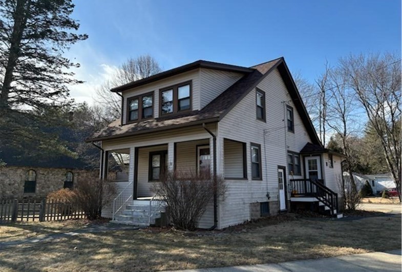 11 Otis Street Mansfield, MA 02048 - Photo 9 of 19 a front view of a house with a yard