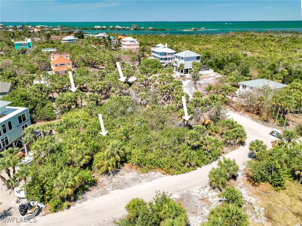 4430 Conch Shell Drive Upper Captiva, FL 33924 - Photo 18 of 32 a view of a city with an ocean
