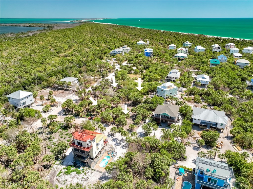 4430 Conch Shell Drive Upper Captiva, FL 33924 - Photo 29 of 32 a view of city and ocean