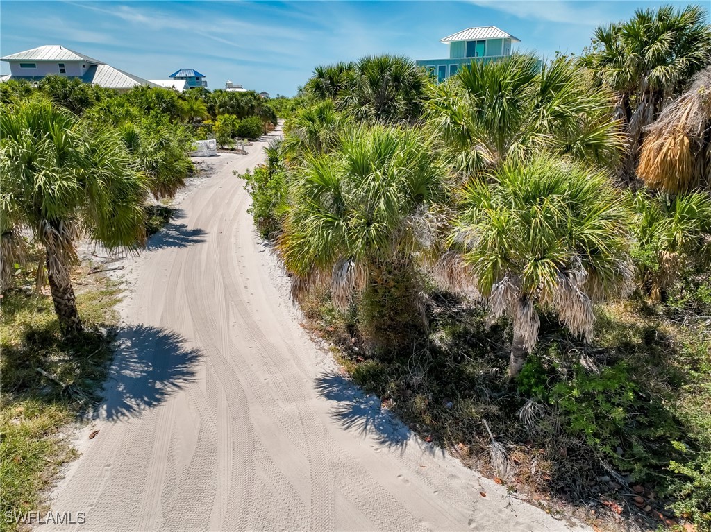 4430 Conch Shell Drive Upper Captiva, FL 33924 - Photo 31 of 32 a view of a lake with a park