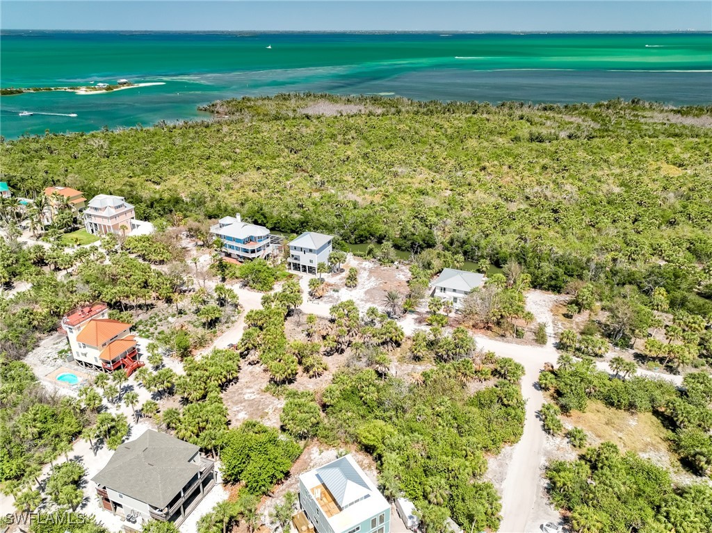 4430 Conch Shell Drive Upper Captiva, FL 33924 - Photo 8 of 32 a view of a yard with an outdoor space