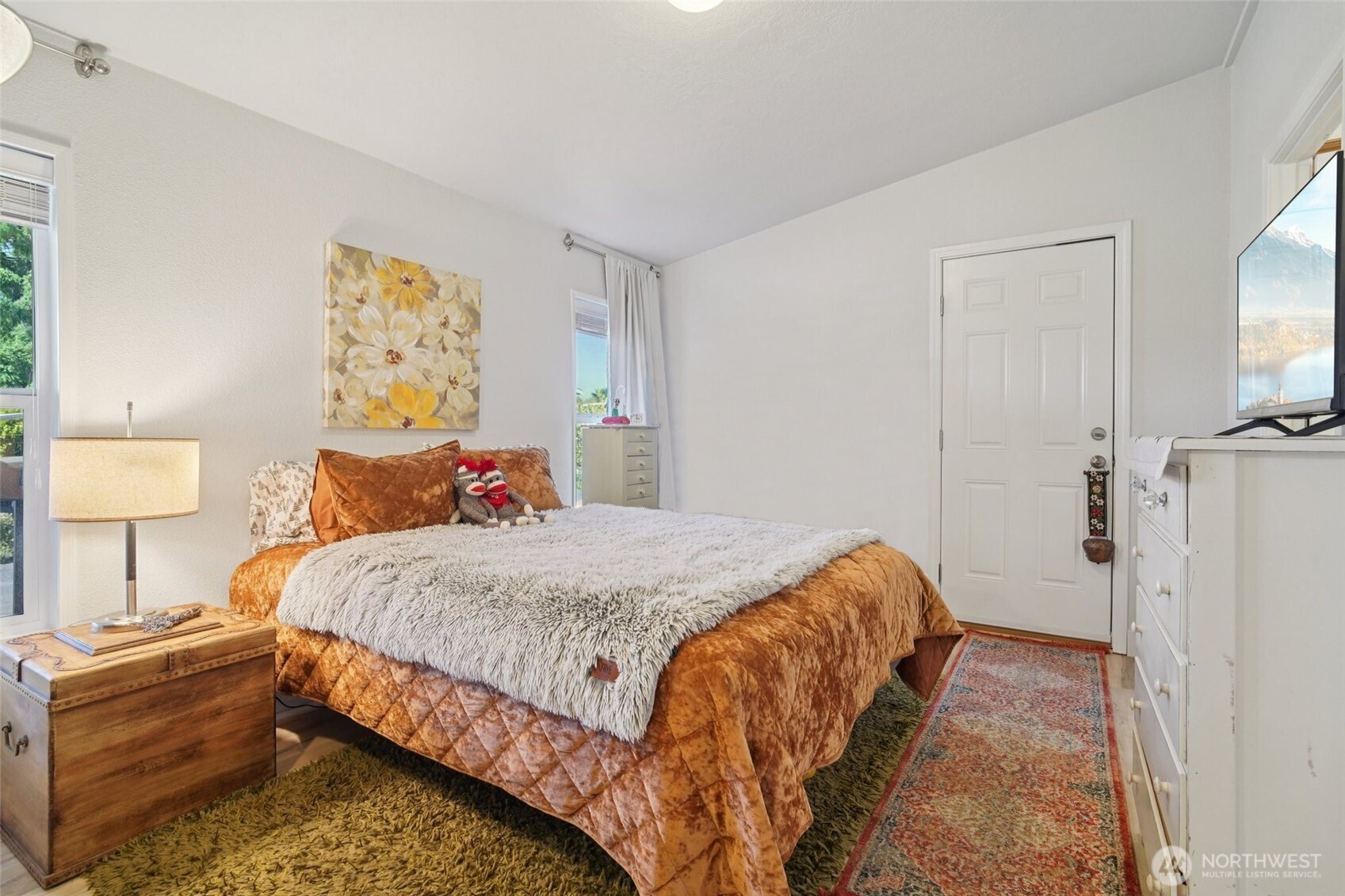 2101 South 324th Street, Unit 166 Federal Way, WA 98003 - Photo 13 of 33 a bedroom with bed and cupboard