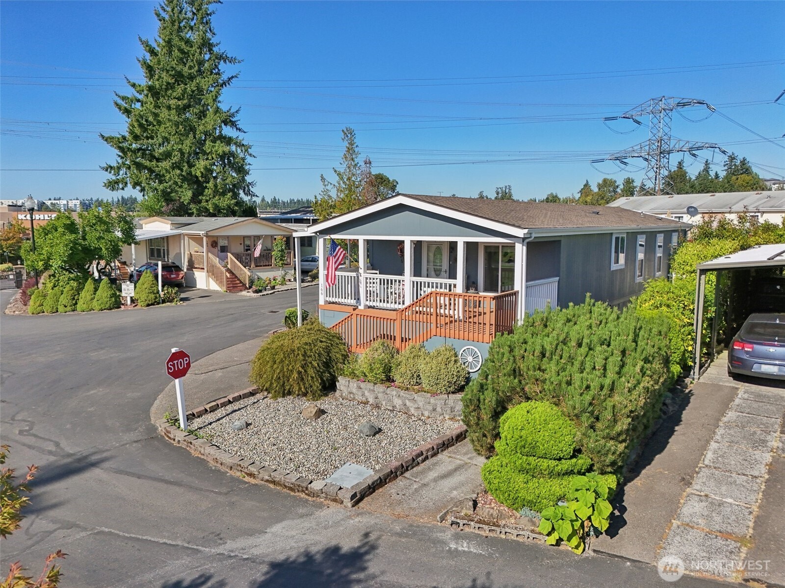 2101 South 324th Street, Unit 166 Federal Way, WA 98003 - Photo 2 of 33 a front view of a house with a yard