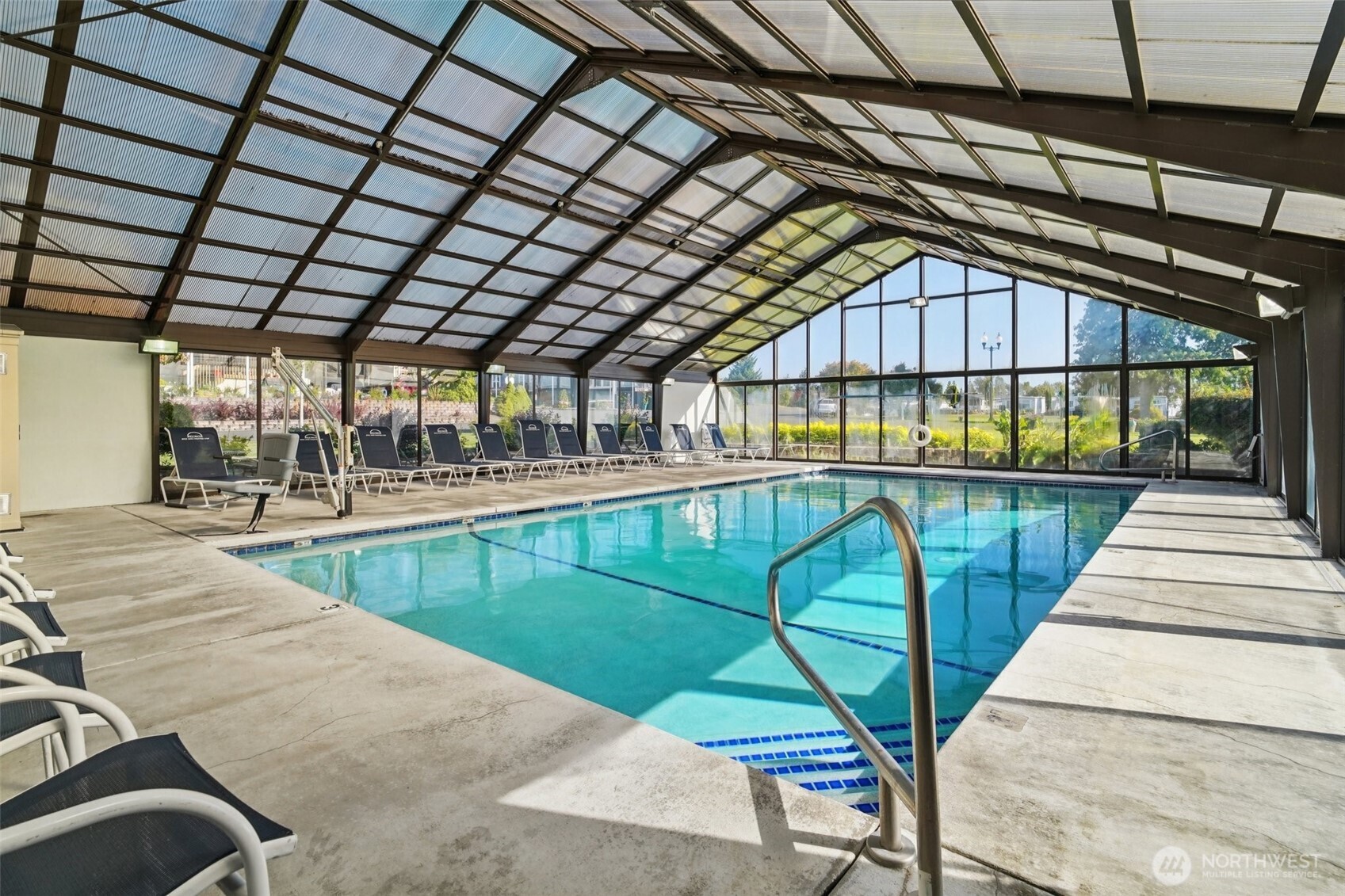 2101 South 324th Street, Unit 166 Federal Way, WA 98003 - Photo 29 of 33 a view of swimming pool with seating area