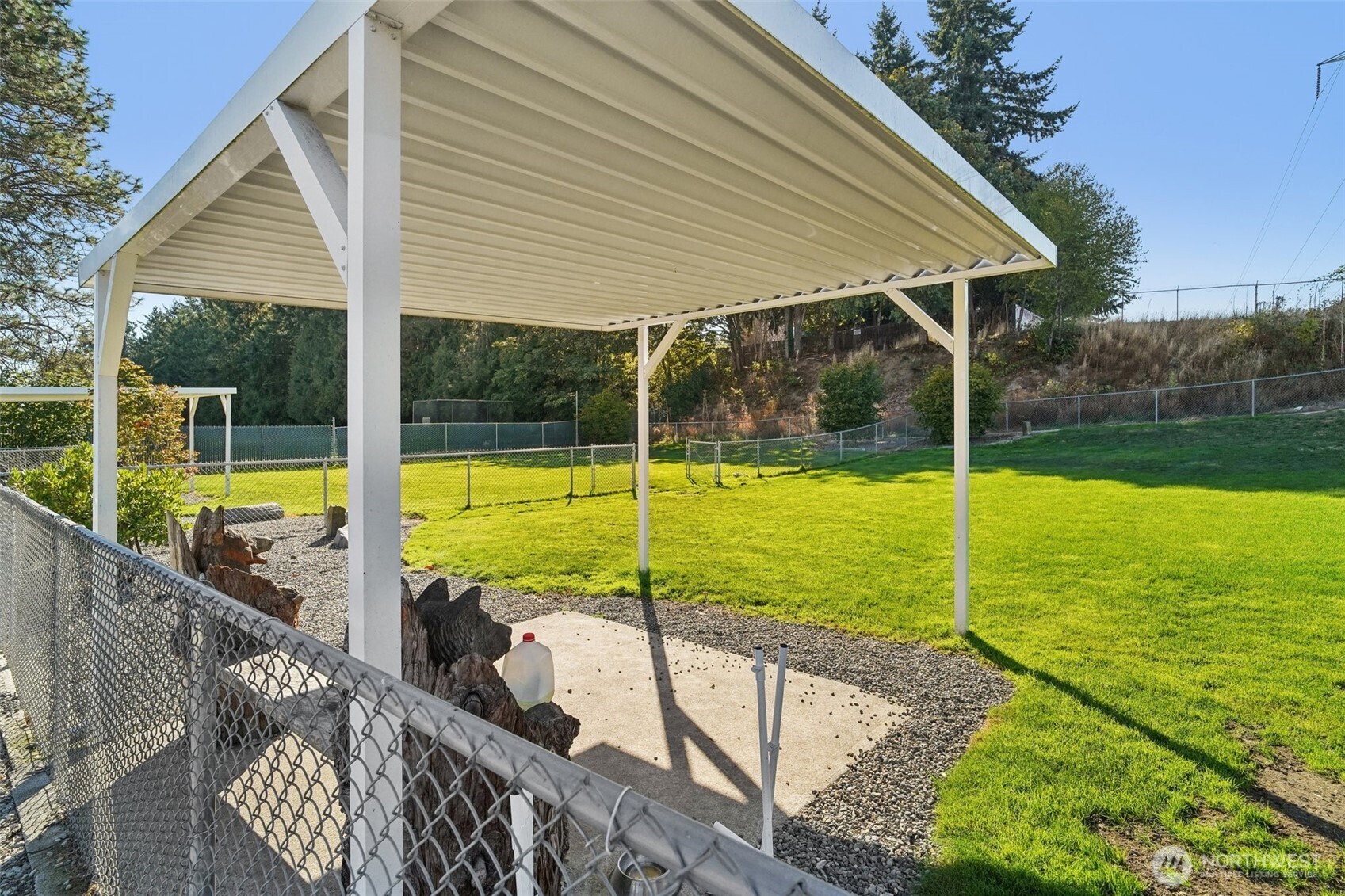 2101 South 324th Street, Unit 166 Federal Way, WA 98003 - Photo 30 of 33 a view of swimming pool with a patio and a backyard