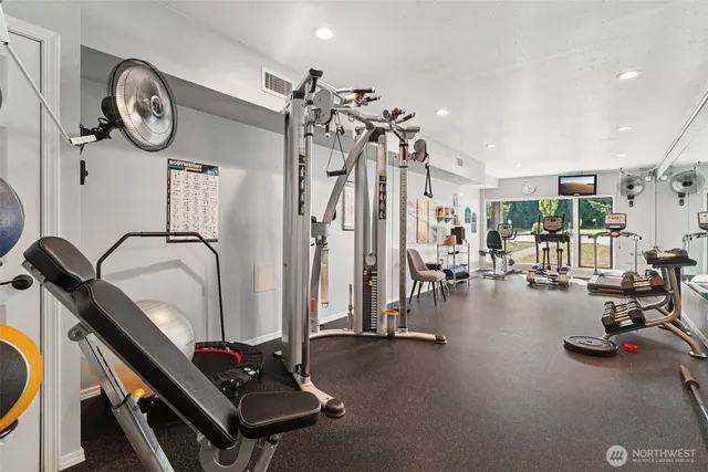 a view of swimming pool with seating area