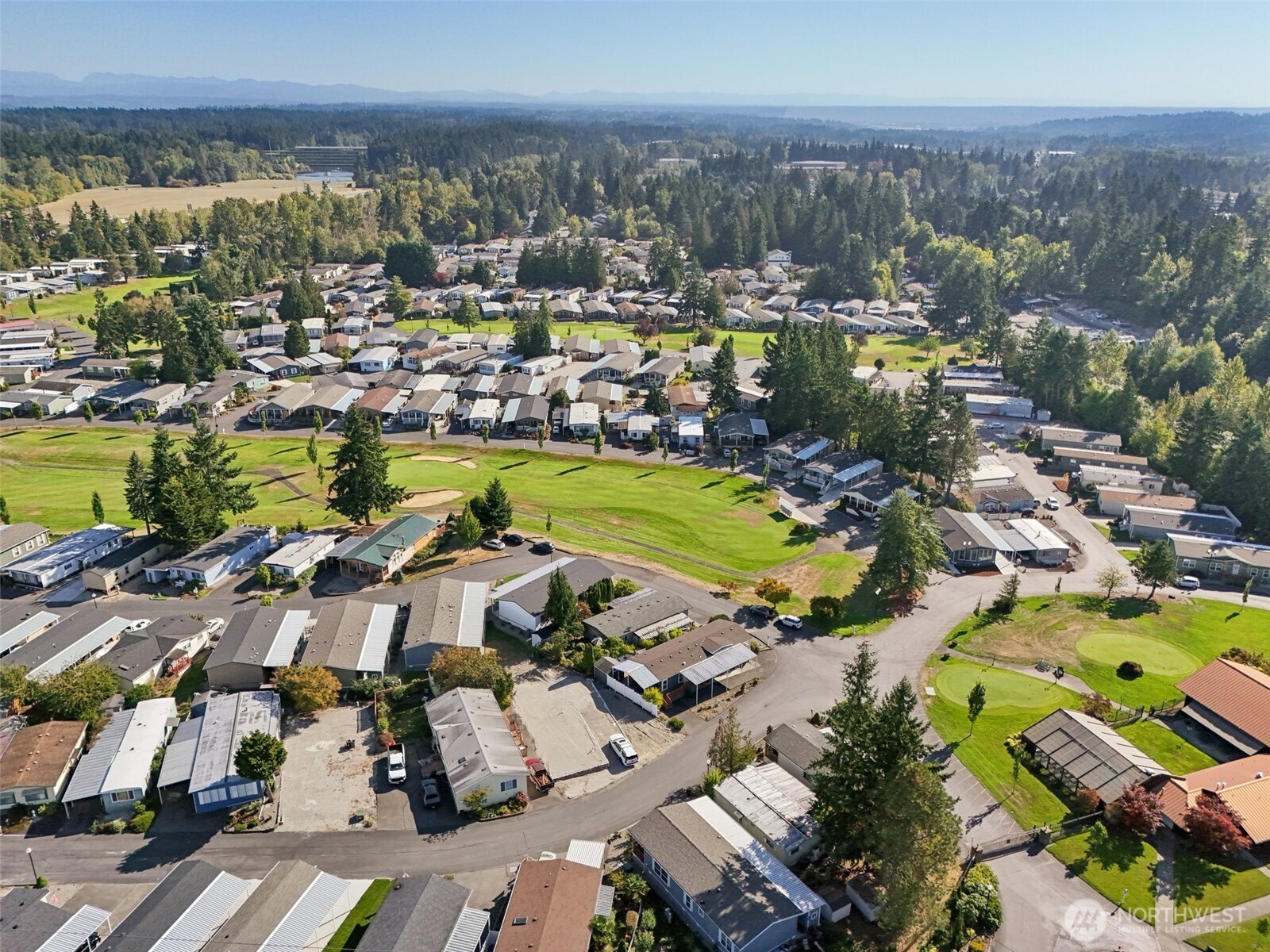2101 South 324th Street, Unit 166 Federal Way, WA 98003 - Photo 33 of 33 an aerial view of residential houses with outdoor space