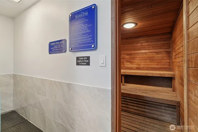 a view of swimming pool with a patio and a backyard