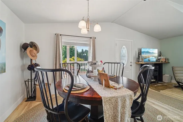 a view of a dining room with furniture