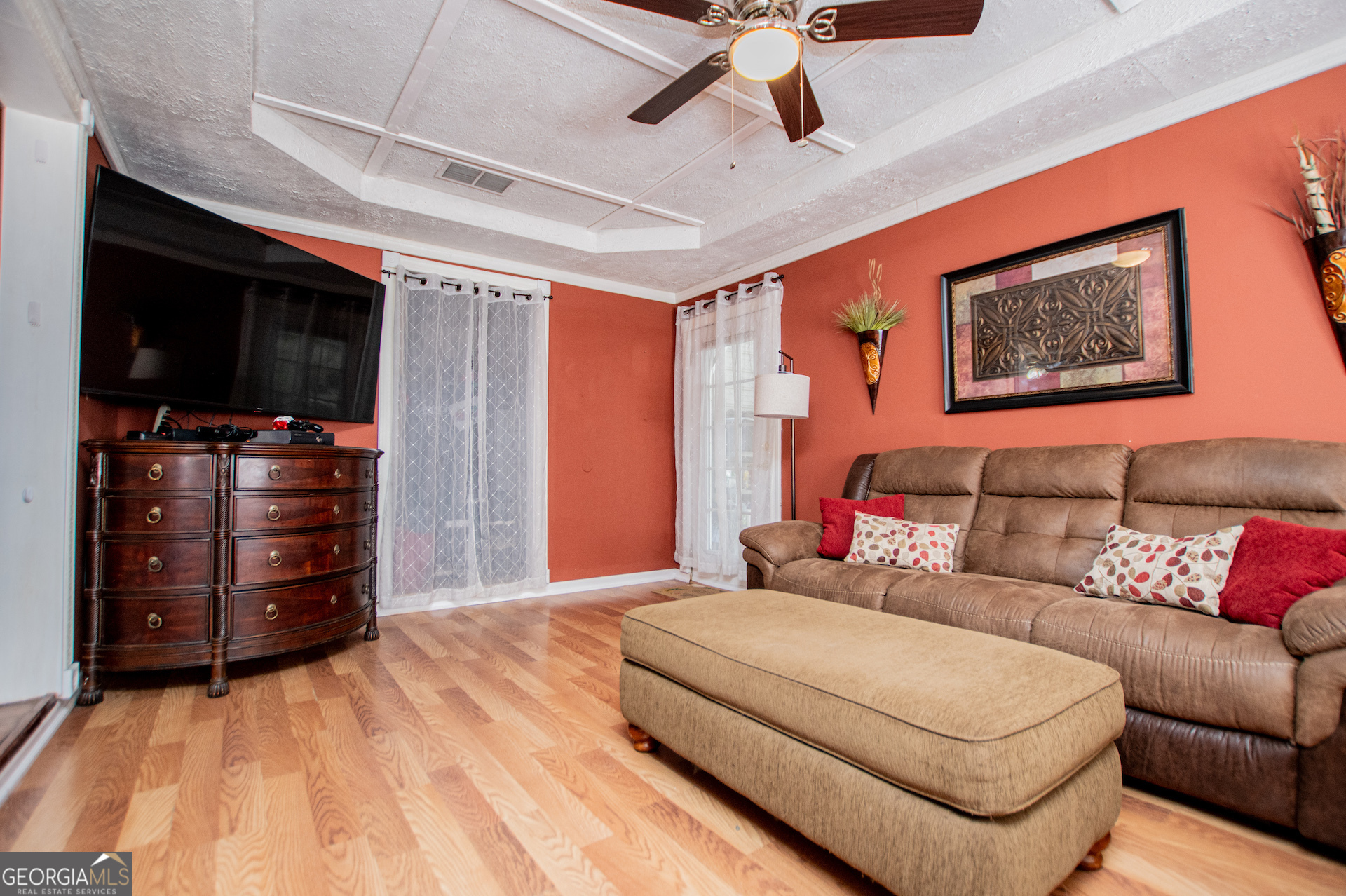 162 Parkway Circle Villa Rica, GA 30180 - Photo 12 of 35 a living room with furniture and a flat screen tv