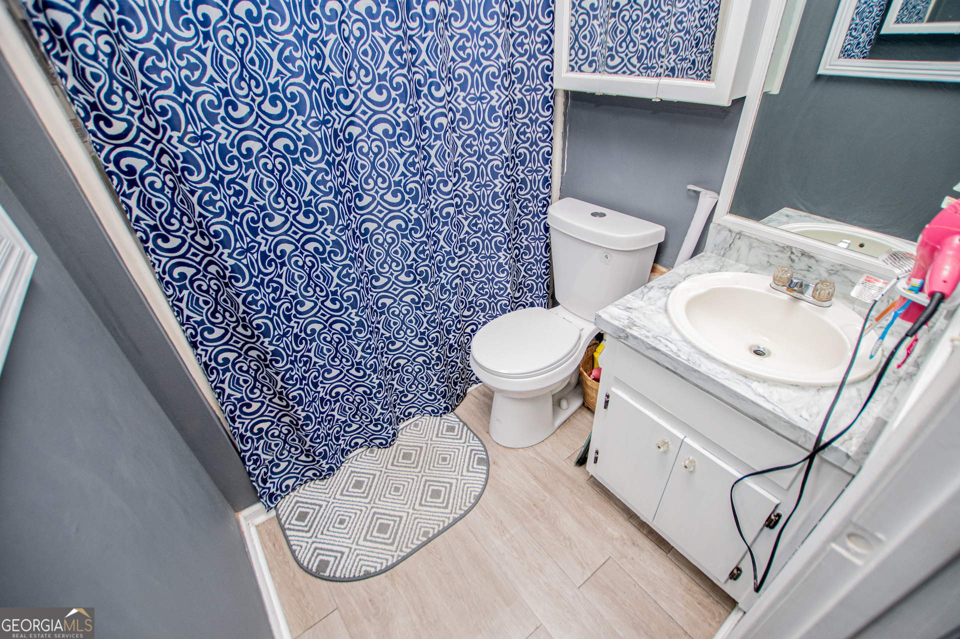 162 Parkway Circle Villa Rica, GA 30180 - Photo 16 of 35 a bathroom with a toilet and a sink