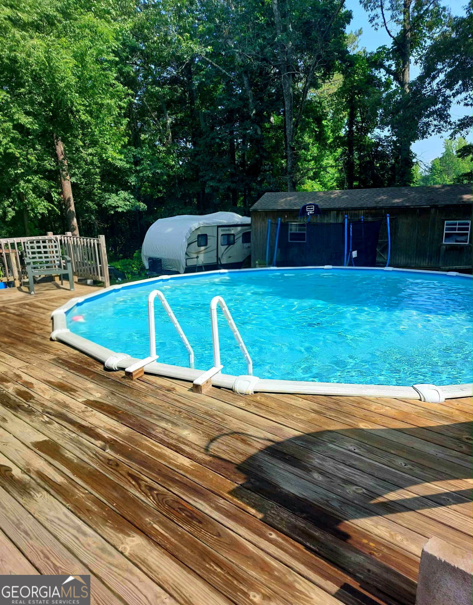 162 Parkway Circle Villa Rica, GA 30180 - Photo 26 of 35 a view of a swimming pool with a yard