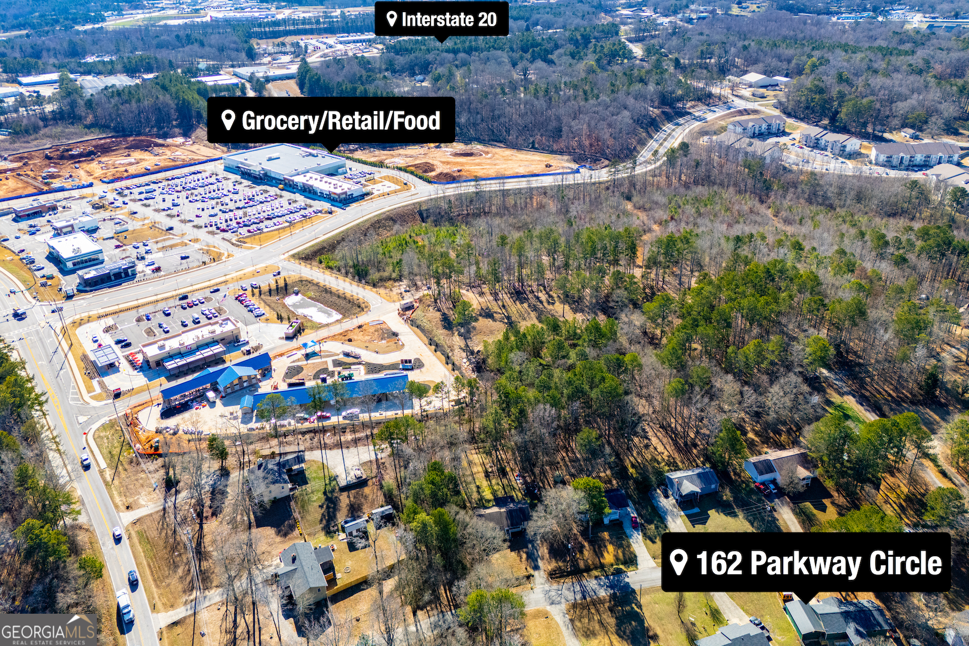 162 Parkway Circle Villa Rica, GA 30180 - Photo 32 of 35 a view of multiple houses with a yard