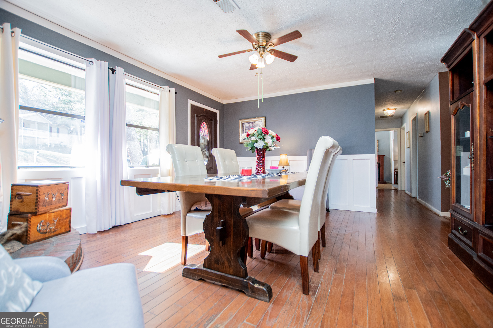 162 Parkway Circle Villa Rica, GA 30180 - Photo 5 of 35 a view of a dining room with furniture window and wooden floor