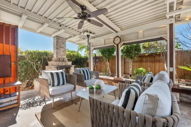 a outdoor living space with furniture and garden view