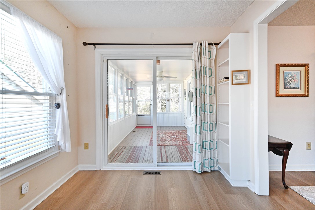 103 Baldwin Place Easley, SC 29642 - Photo 19 of 42 This bright space features ample natural light and a seamless transition to the sunroom.