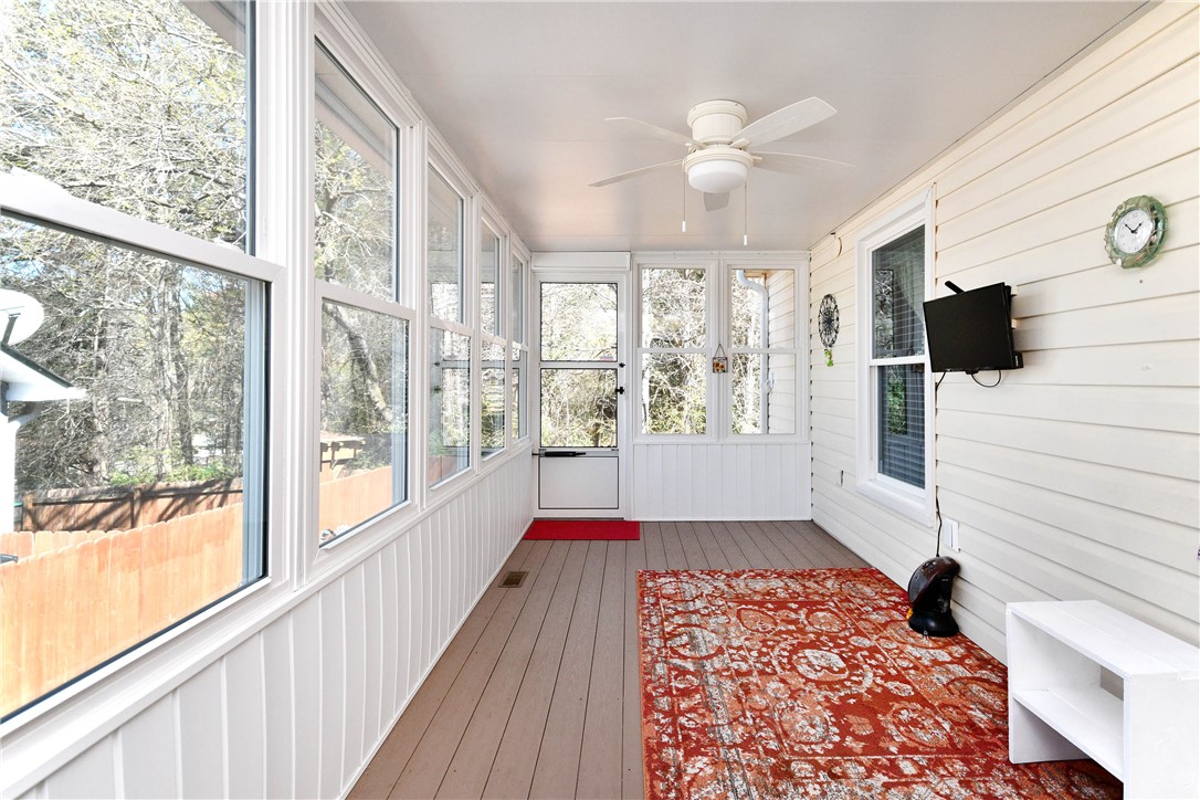 103 Baldwin Place Easley, SC 29642 - Photo 20 of 42 This bright sunroom offers tranquil views and an inviting space for relaxation.