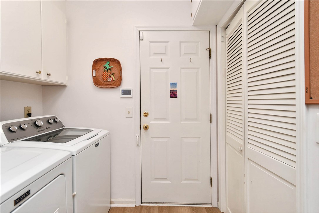 103 Baldwin Place Easley, SC 29642 - Photo 27 of 42 This dedicated laundry space combines convenience and practical design for everyday tasks.